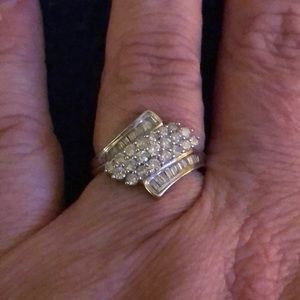 10k white gold fancy diamond dinner ring.